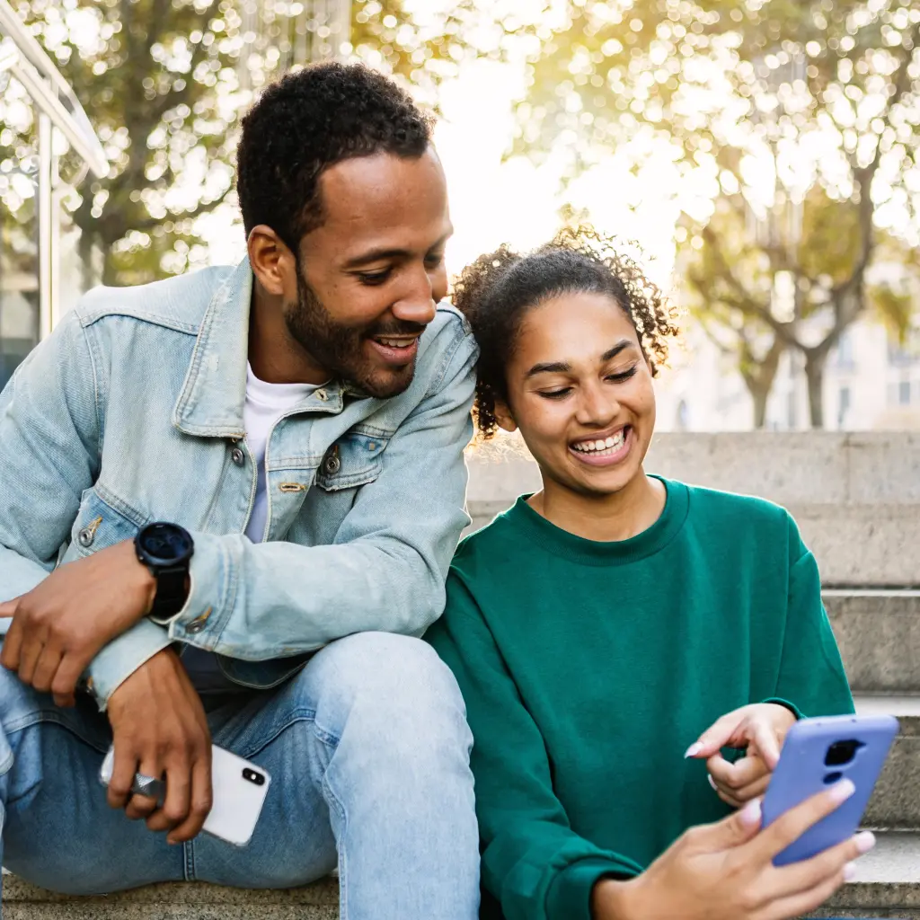 friends looking at phone