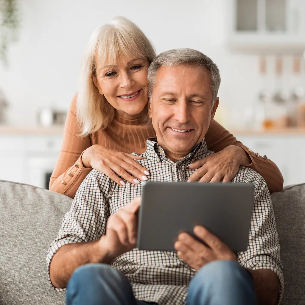 Couple looking at tablet